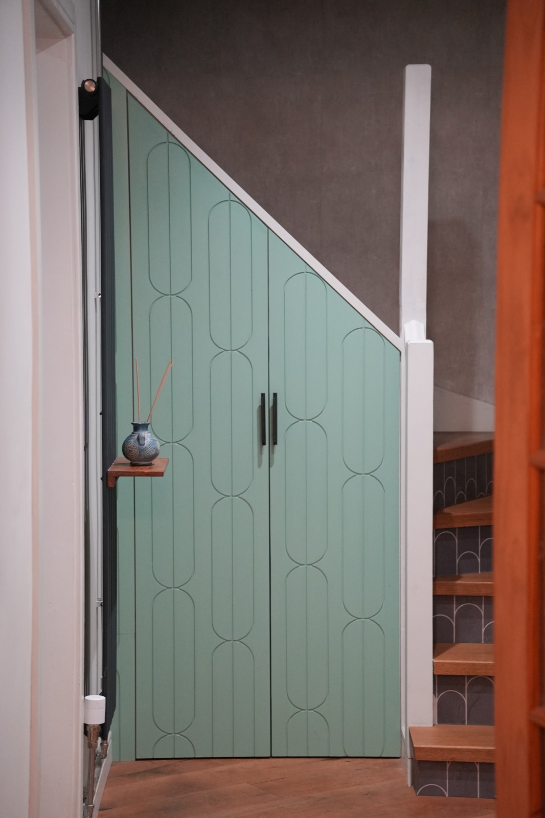 Bespoke sage green cabinet doors with decorative panelling