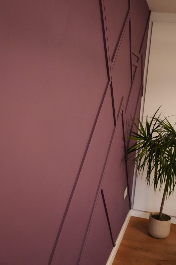 Decorative purple wall panelling with geometric design
